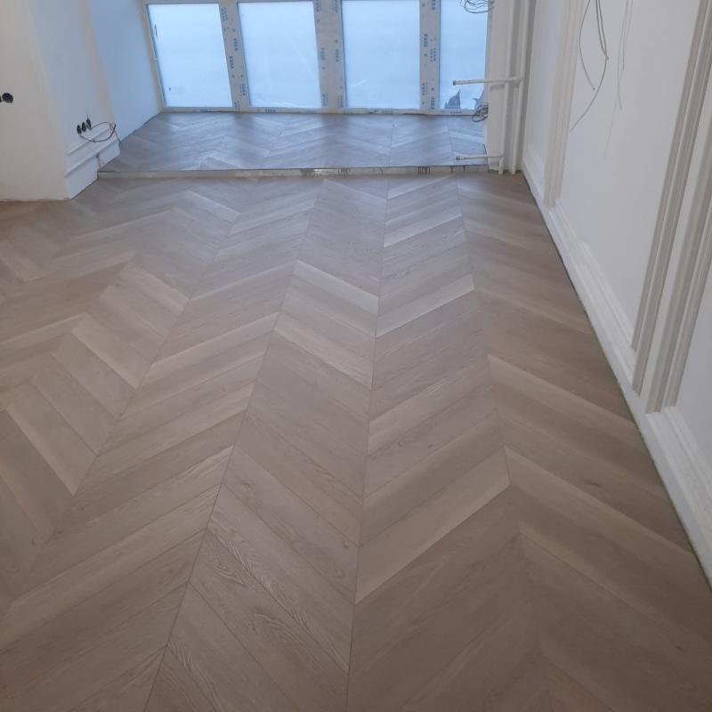 Укладка Каменного ламината SPC Aberhof Chevron